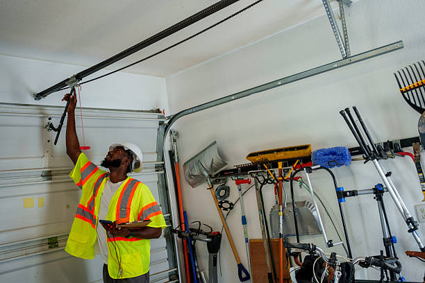 Professional Garage Door Maintenance technician working in Salem, OR
